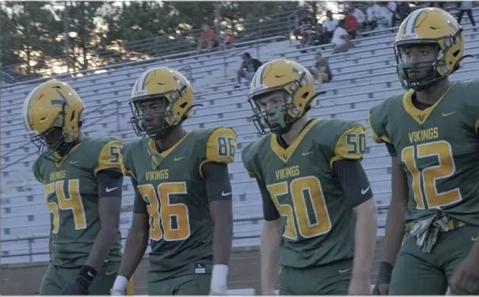 Spring Valley Vikings players walking out